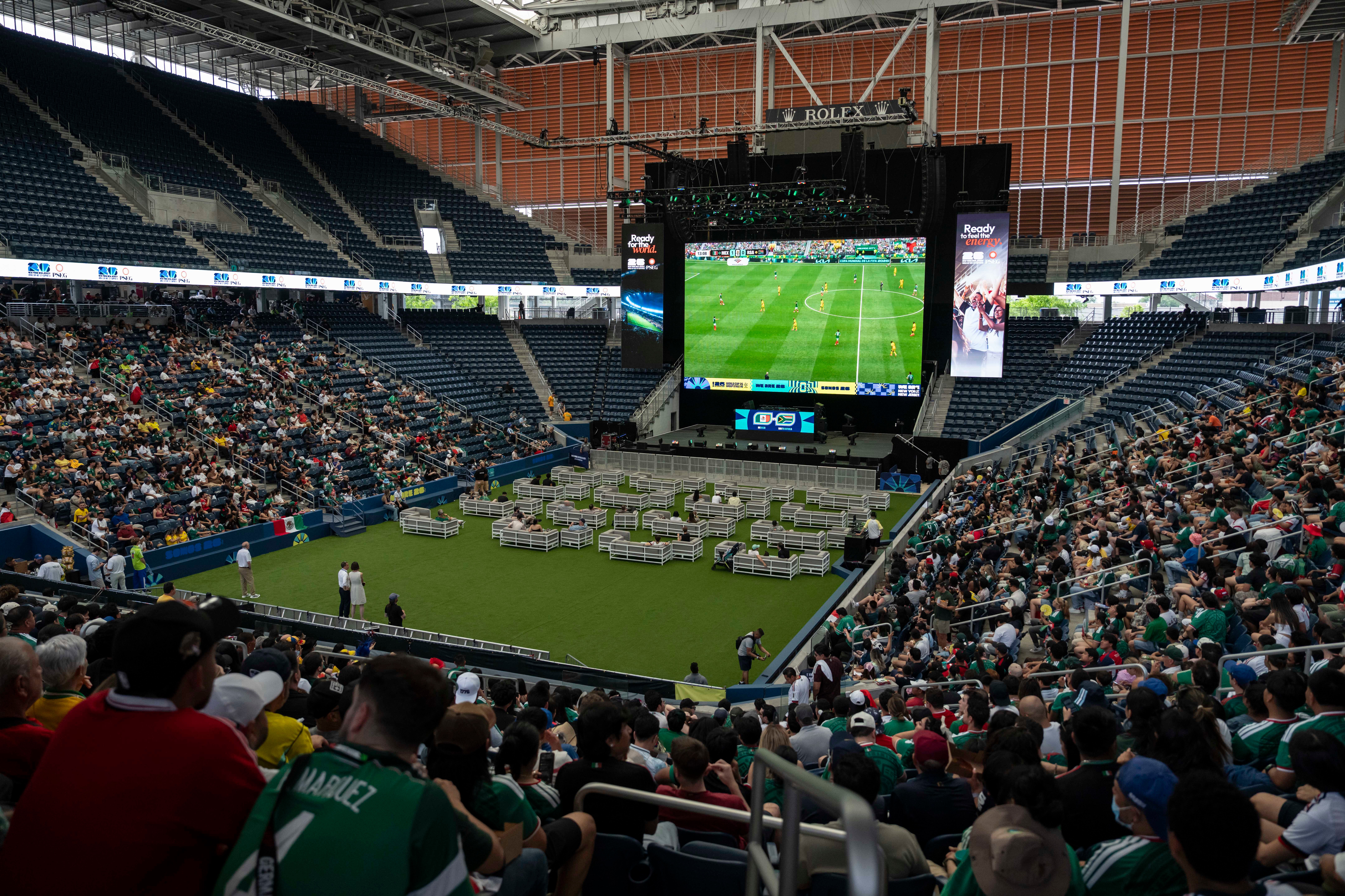 Spectators watch the opening match of the World Cup soccer tournament between Mexico and South Africa, Thursday, June 11, 2026, at the USTA Billie Jean King National Tennis Center in New York. 