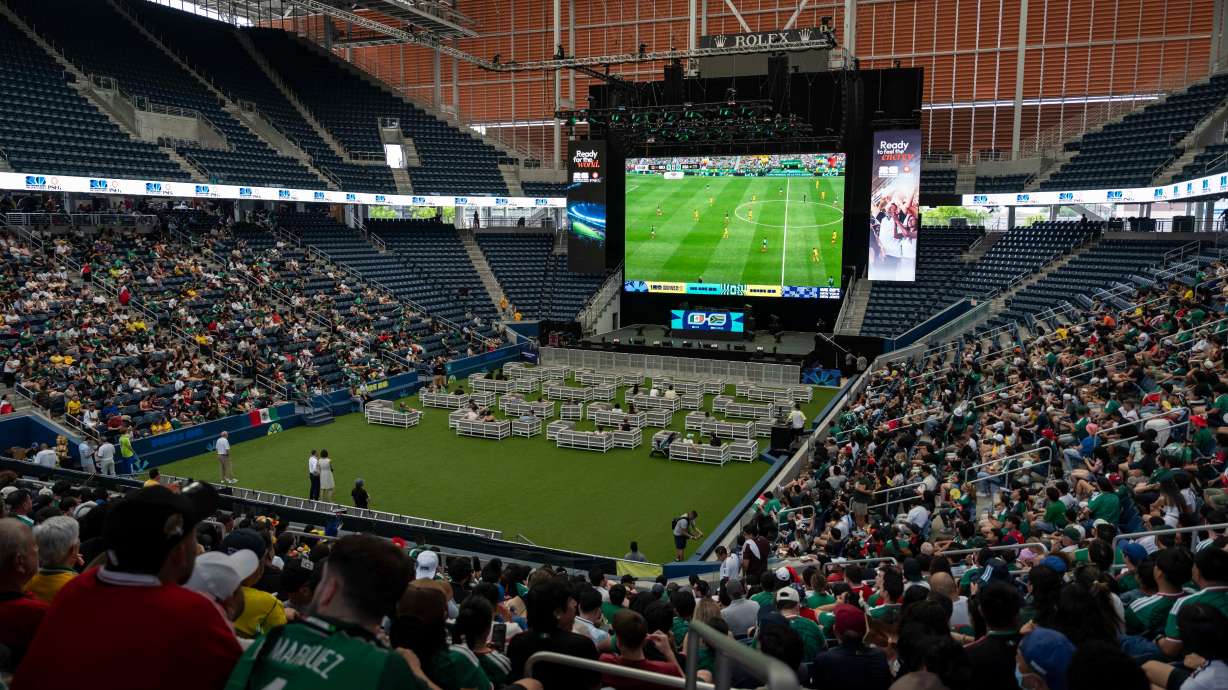 Spectators watch the opening match of the World Cup soccer tournament between Mexico and South Africa, Thursday, June 11, 2026, at the USTA Billie Jean King National Tennis Center in New York.