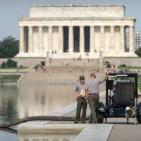 Crews are draining the Lincoln Memorial Reflecting Pool again as part of Trump's troubled revamp