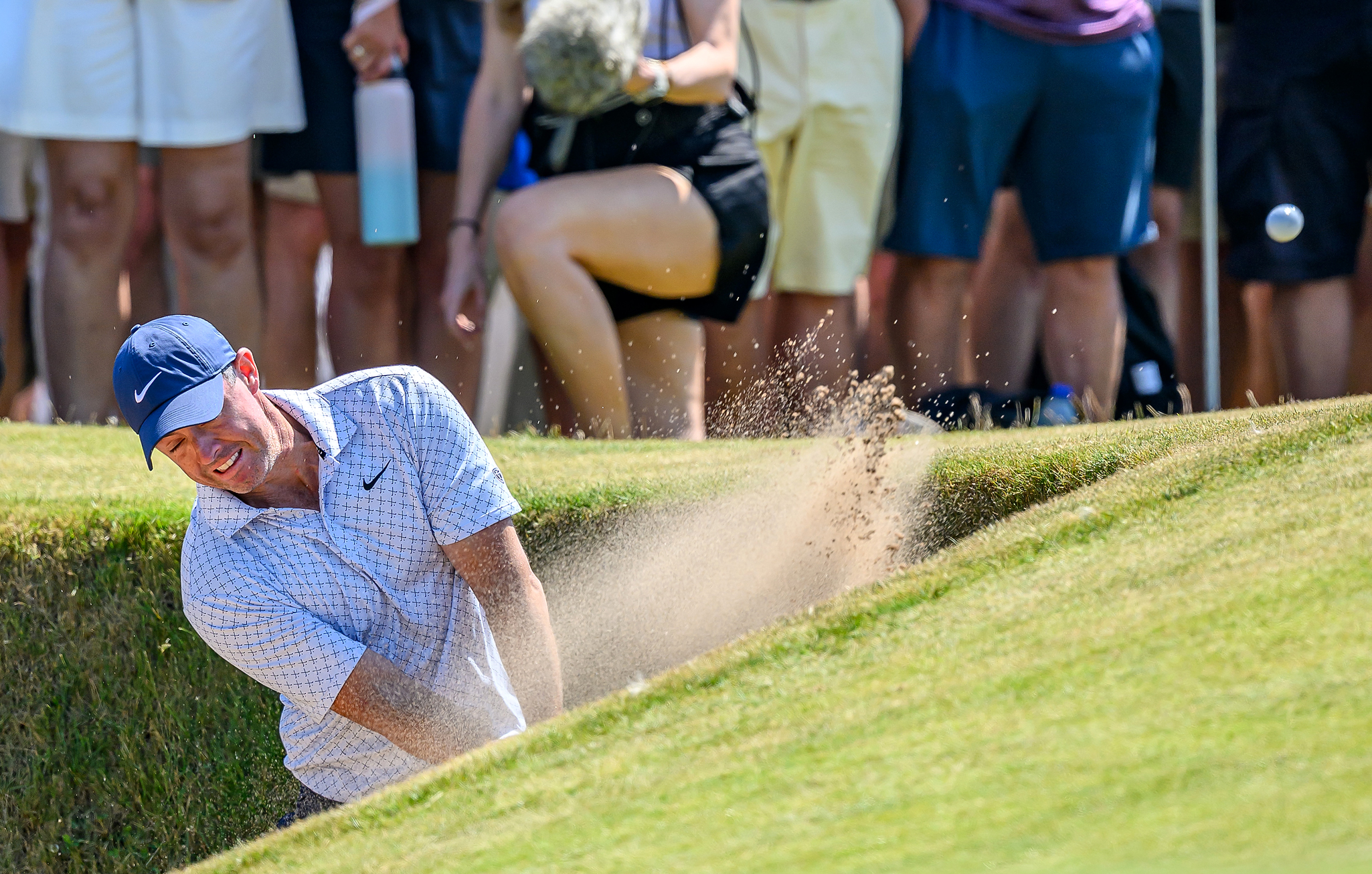 Rory McIlroy, of Northern Ireland, plays from a bunker on the ninth fairway during day one of the Genesis Scottish Open 2026 at The Renaissance Club in North Berwick, Scotland, Thursday, July 9, 2026. 
