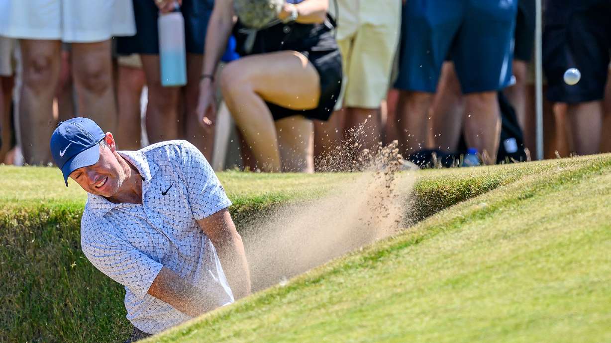 Rory McIlroy, of Northern Ireland, plays from a bunker on the ninth fairway during day one of the Genesis Scottish Open 2026 at The Renaissance Club in North Berwick, Scotland, Thursday, July 9, 2026.