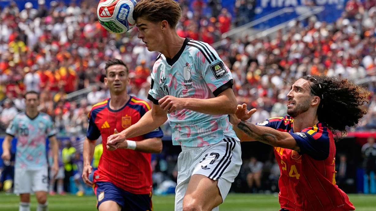 Belgium's Charles De Ketelaere (17) challenges for the ball with Spain's Marc Cucurella (24) during the World Cup quarterfinal soccer match between Spain and Belgium in Inglewood, Calif., near Los Angeles, Friday, July 10, 2026.