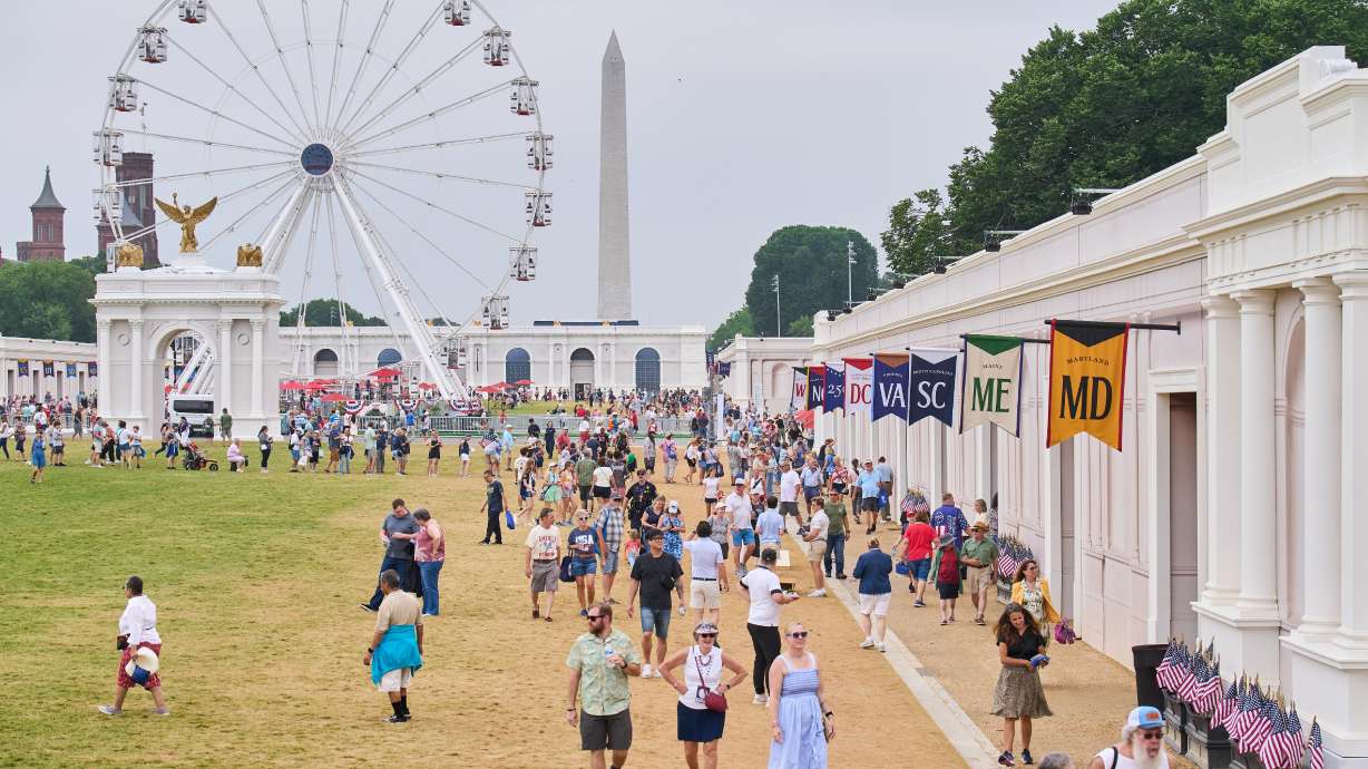 People attend the Great American State Fair on the National Mall, Tuesday in Washington.