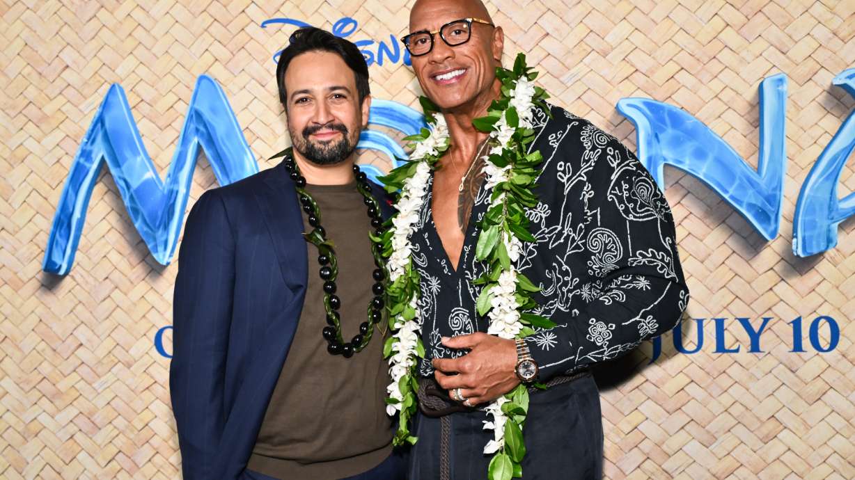 Lin-Manuel Miranda, left, and Dwayne Johnson arrive at a special screening of Disney's "Moana" at the United Palace on Thursday, in New York.