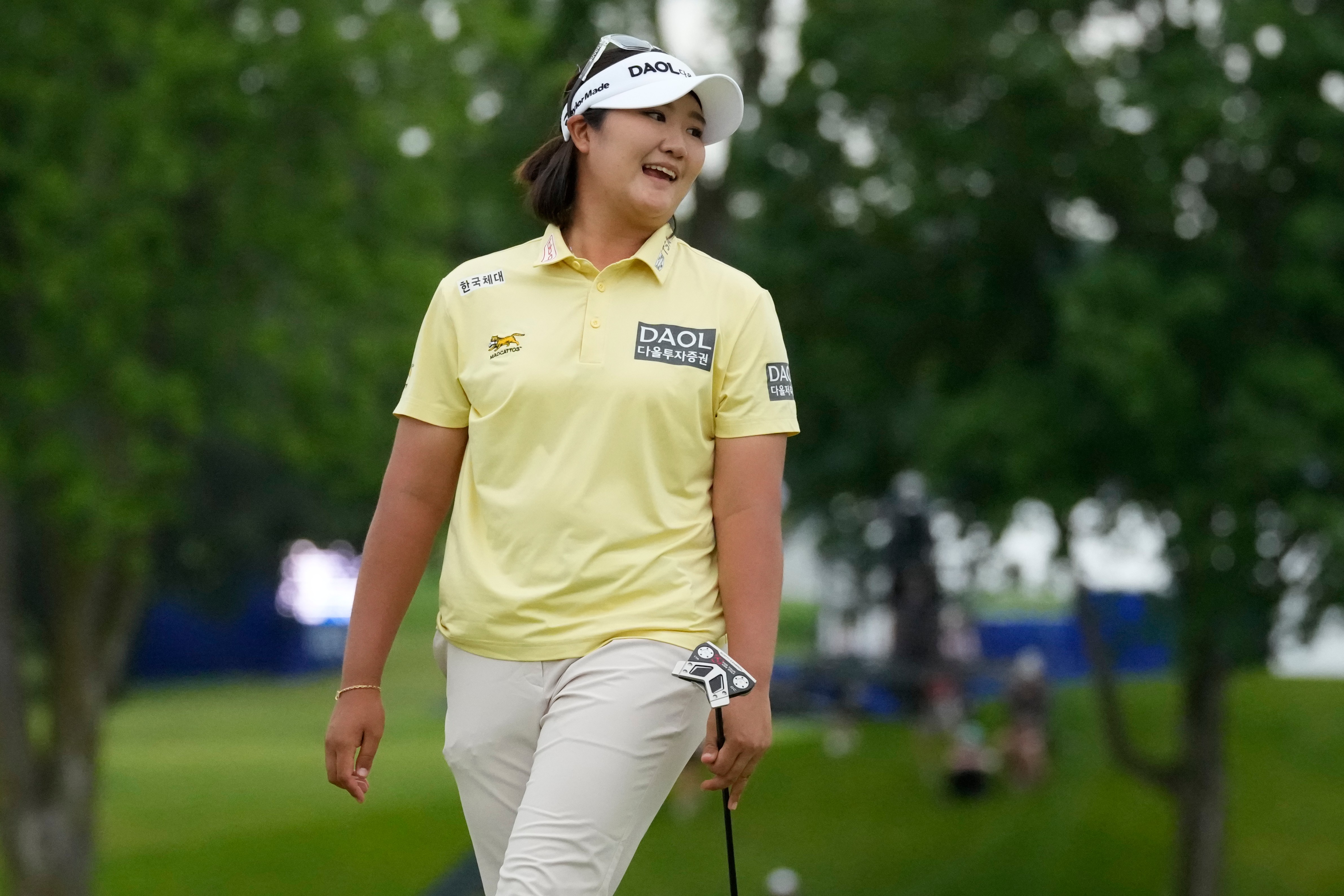 Haeran Ryu, of South Korea, reacts on the 18th green after a putt during the final round of the Women's PGA Championship golf tournament at Hazeltine National Golf Club, Sunday, June 28, 2026, in Chaska, Minn. 