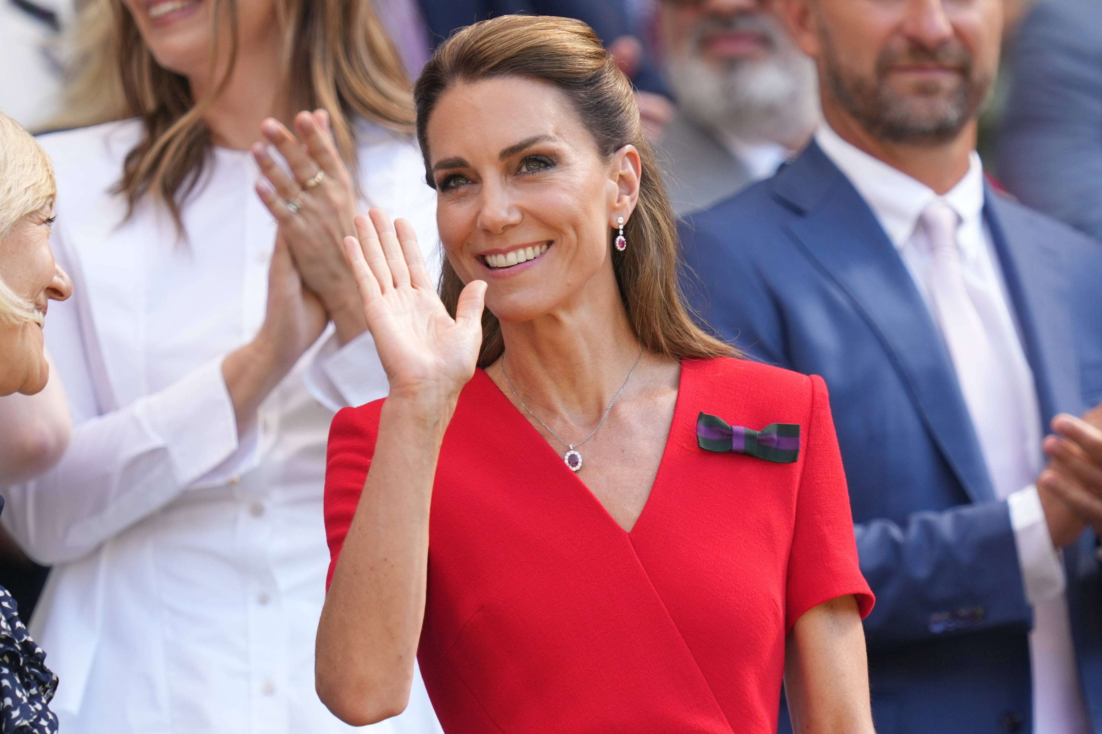 Britain's Princess Kate waves from the royal box on day 13 of the Wimbledon Tennis Championships in London, Saturday, July 11, 2026. 