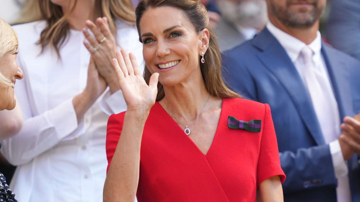 Britain's Princess Kate waves from the royal box on day 13 of the Wimbledon Tennis Championships in London, Saturday, July 11, 2026.