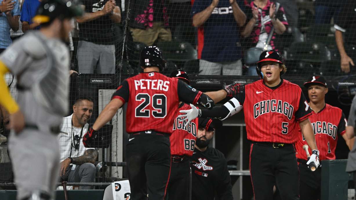 Chicago White Sox's Tristan Peters (29) celebrates with teammate Munetaka Murakami (5) at the dugout after hitting a two-run home run during the seventh inning of a baseball game against The Athletics in Chicago, Friday, July 10, 2026.