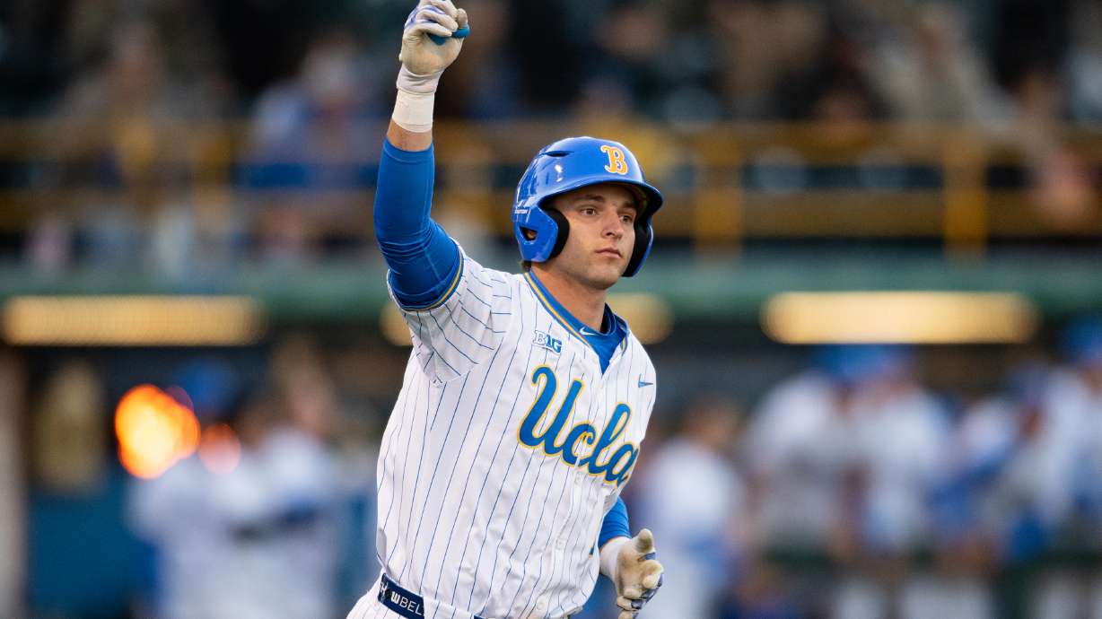 FILE - UCLA's Roch Cholowsky reacts after hitting a home run during an NCAA baseball game against Texas Christian, Feb. 20, 2025, in Los Angeles.