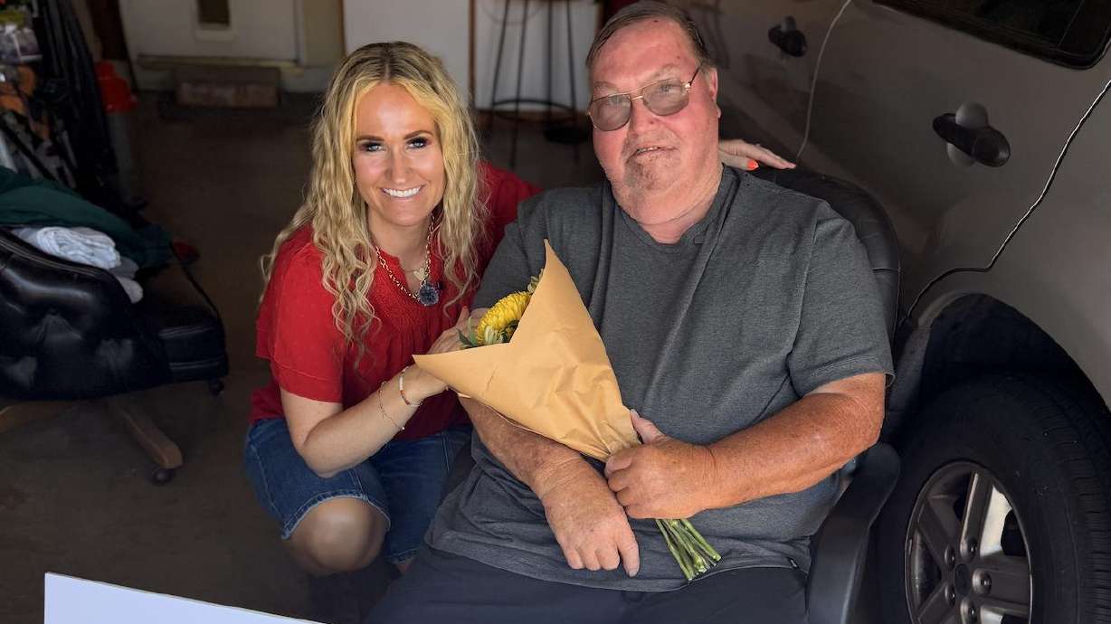 The picture was taken on June 27 when LaCinda Thackeray delivered a $174,000 check to James Blair at his home in California.