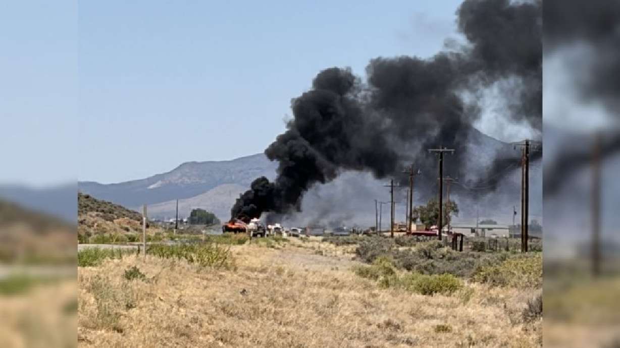 A semitruck rolled over and caught fire on State route 56 near Modena, Iron County, on Saturday.