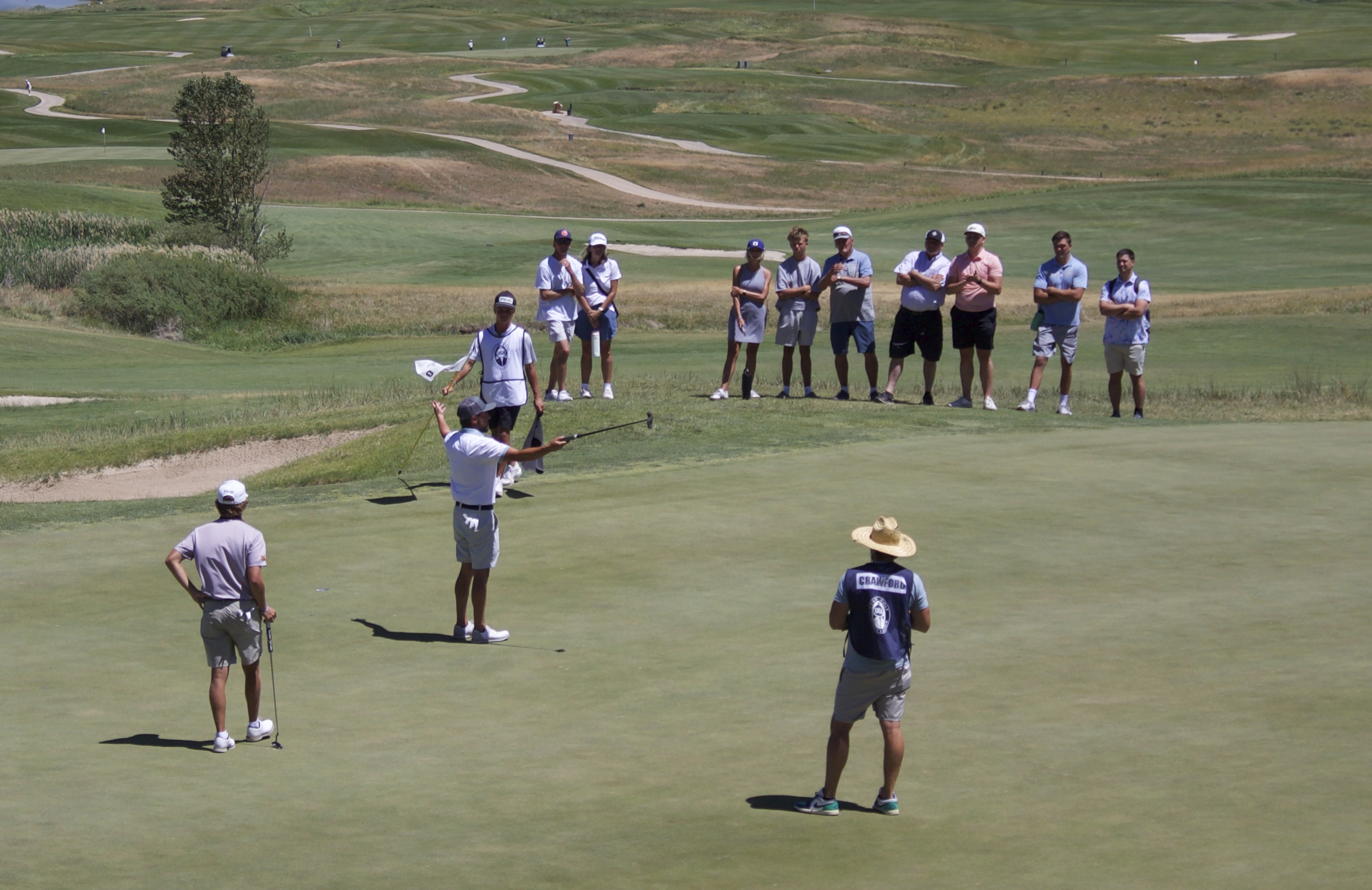 Cedar Hills mid-amateur Cameron Crawford reacts after sinking a birdie putt on the eighth hole of the 128th Utah state amateur championship, Saturday, July 11, 2026 at Soldier Hollow Golf Course in Midway.