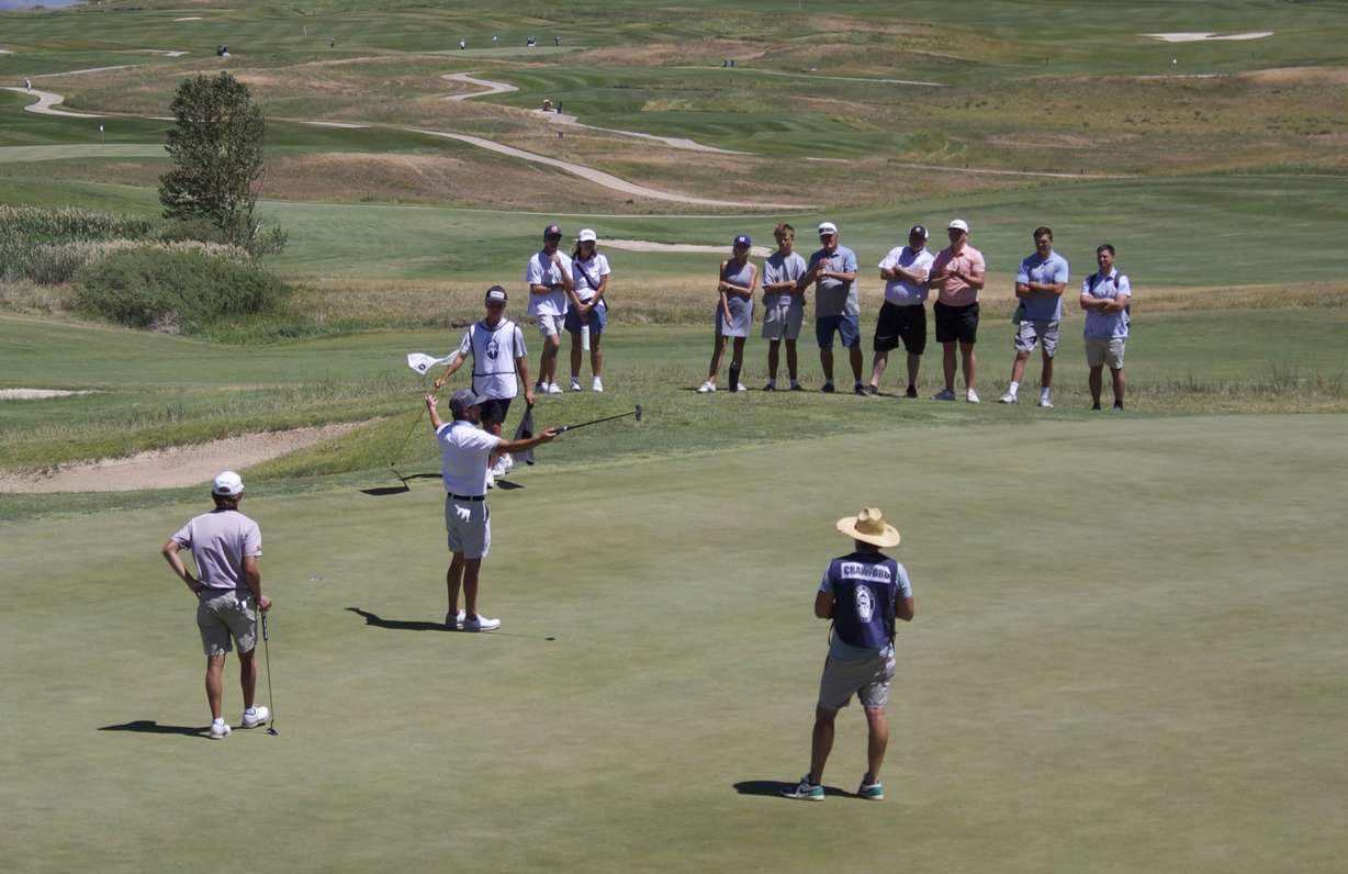 Cedar Hills mid-amateur Cameron Crawford reacts after sinking a birdie putt on the eighth hole of the 128th Utah state amateur championship, Saturday, July 11, 2026 at Soldier Hollow Golf Course in Midway.