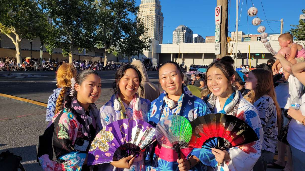 From left to right, Akemi Kawabata, Megan Matsuura, Kindra Hirasuna and Kimari Matsuura all pose before they prepare to dance in the Japanese Obon Festival on Saturday.