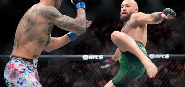 Conor McGregor suffers early knee injury in return, loses to Max Holloway at UFC 329