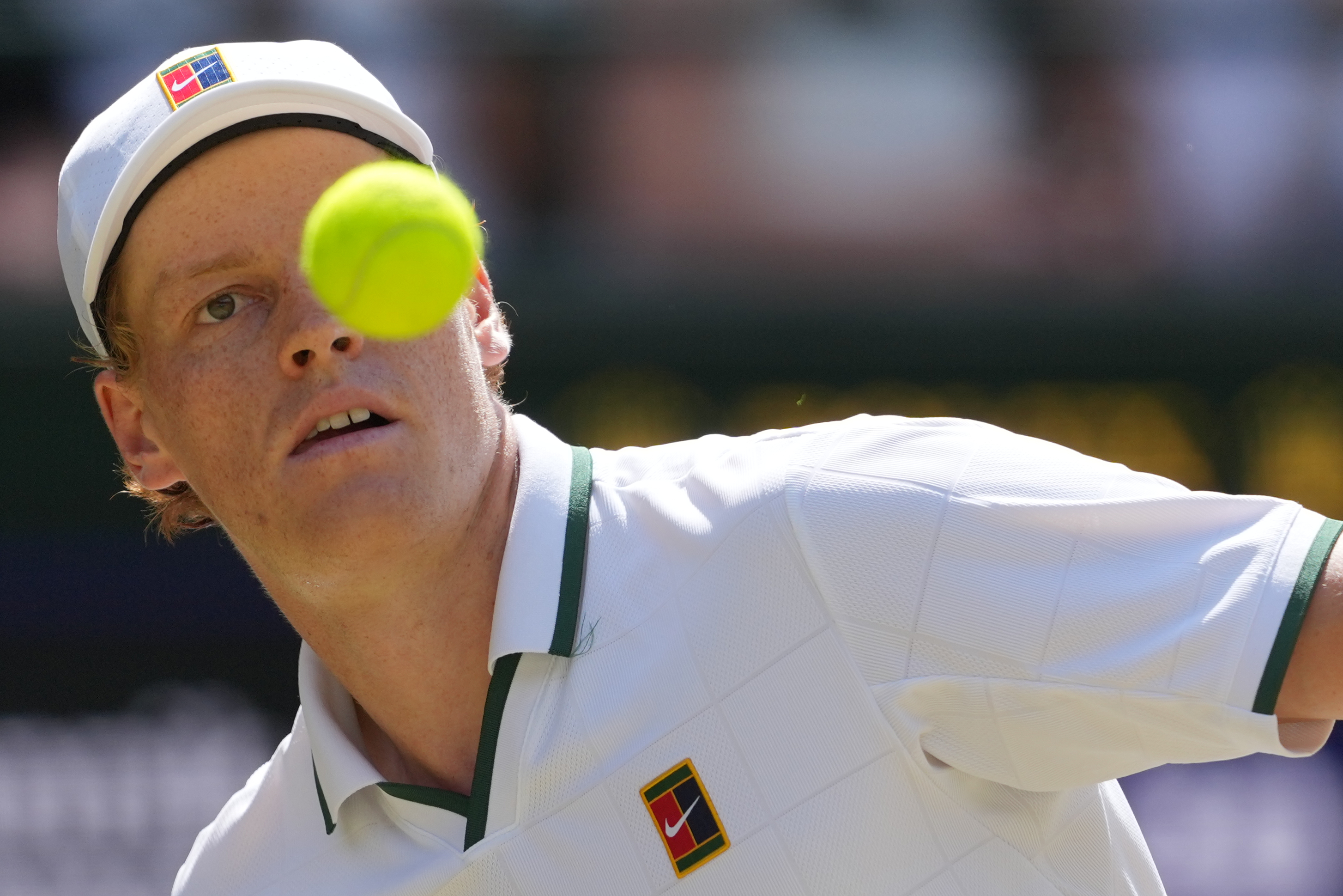 Jannik Sinner of Italy eyes the ball as he prepares to play a forehand against Jan-Lennard Struff of Germany in their quarter-final men's singles match at the Wimbledon Tennis Championships in London, Tuesday, July 7, 2026. 