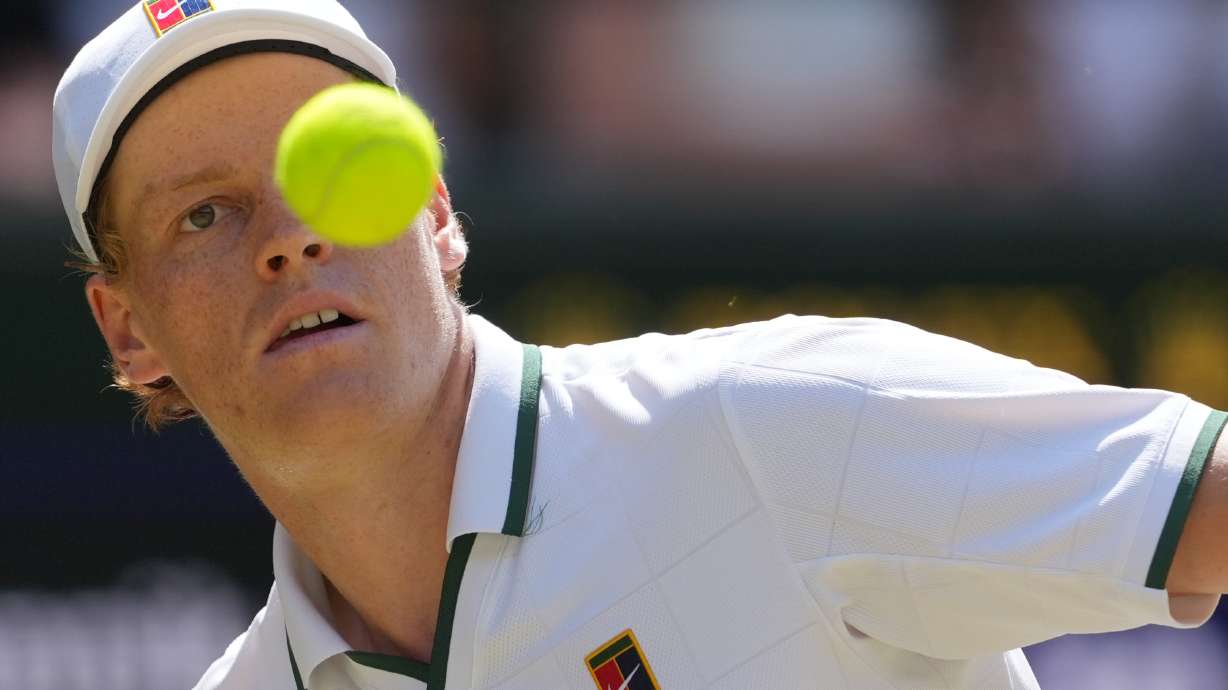 Jannik Sinner of Italy eyes the ball as he prepares to play a forehand against Jan-Lennard Struff of Germany in their quarter-final men's singles match at the Wimbledon Tennis Championships in London, Tuesday, July 7, 2026.