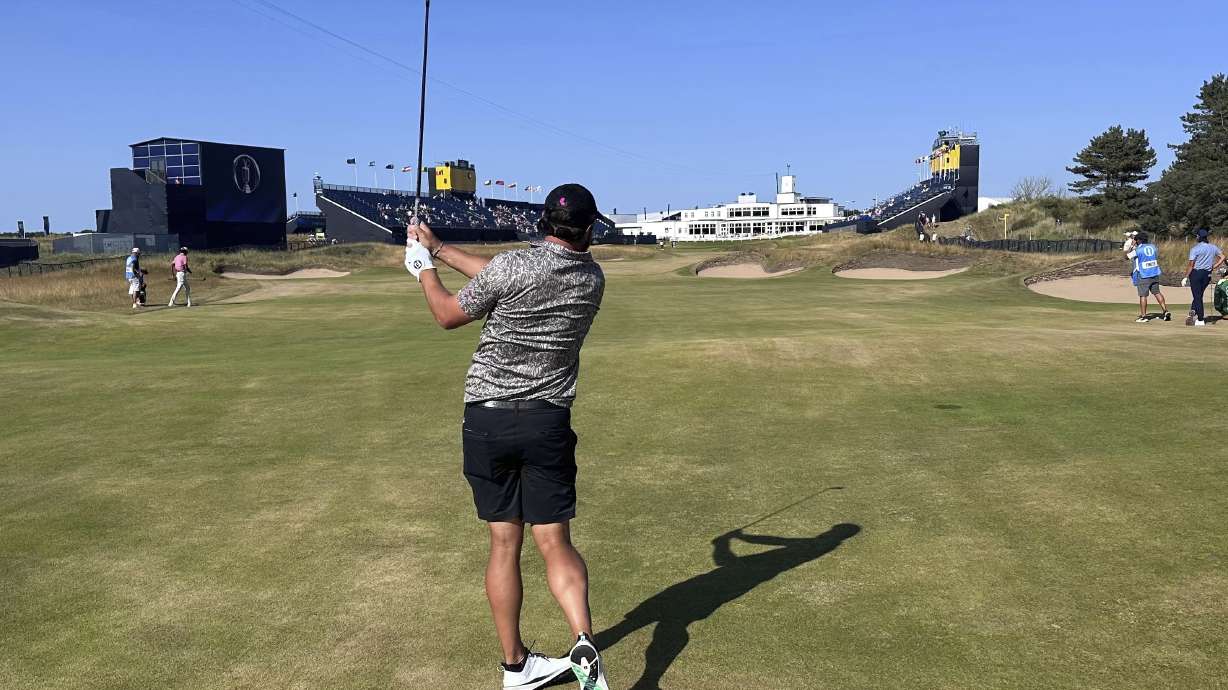 Peter Uihlein watches his 2-iron to the 18th green at Royal Birkdale on Sunday, July 12, 2026 in Southport, England, as he prepares for the British Open