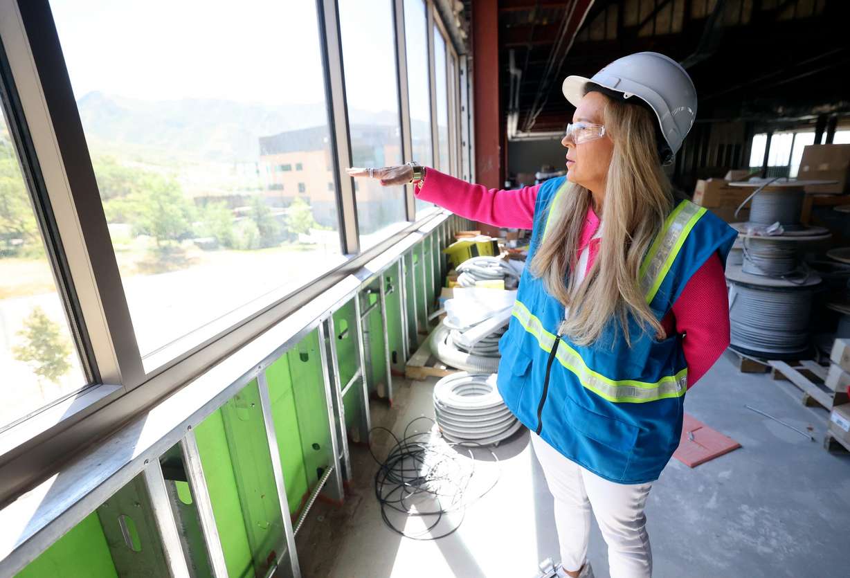 Christena Huntsman Durham, Huntsman Family Foundation director, executive vice president and vice chair, and Huntsman Mental Health Foundation CEO, looks out from the future Utah Mental Health Translational Research Building at the University of Utah Huntsman Mental Health Institute in Salt Lake City on June 18.