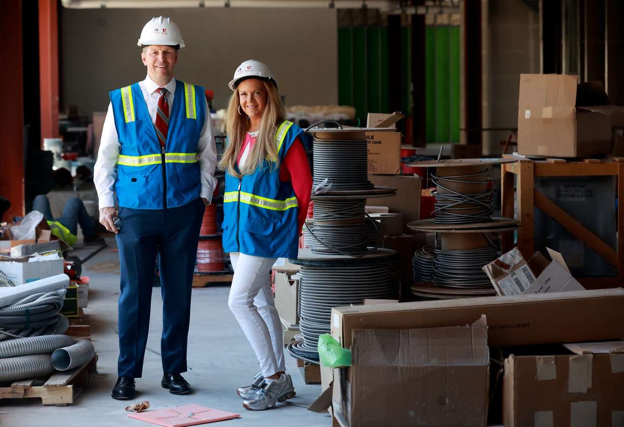 Brett Graham, Huntsman Health Institute president, and Christena Huntsman Durham, Huntsman Family Foundation director, executive vice president and vice chair, and Huntsman Mental Health Foundation CEO, pose for a portrait in the future Utah Mental Health Translational Research Building at the University of Utah Huntsman Mental Health Institute in Salt Lake City on Thursday, June 18, 2026. The Huntsman Family Foundation donated $150 million to the University of Utah for the mental health institute.