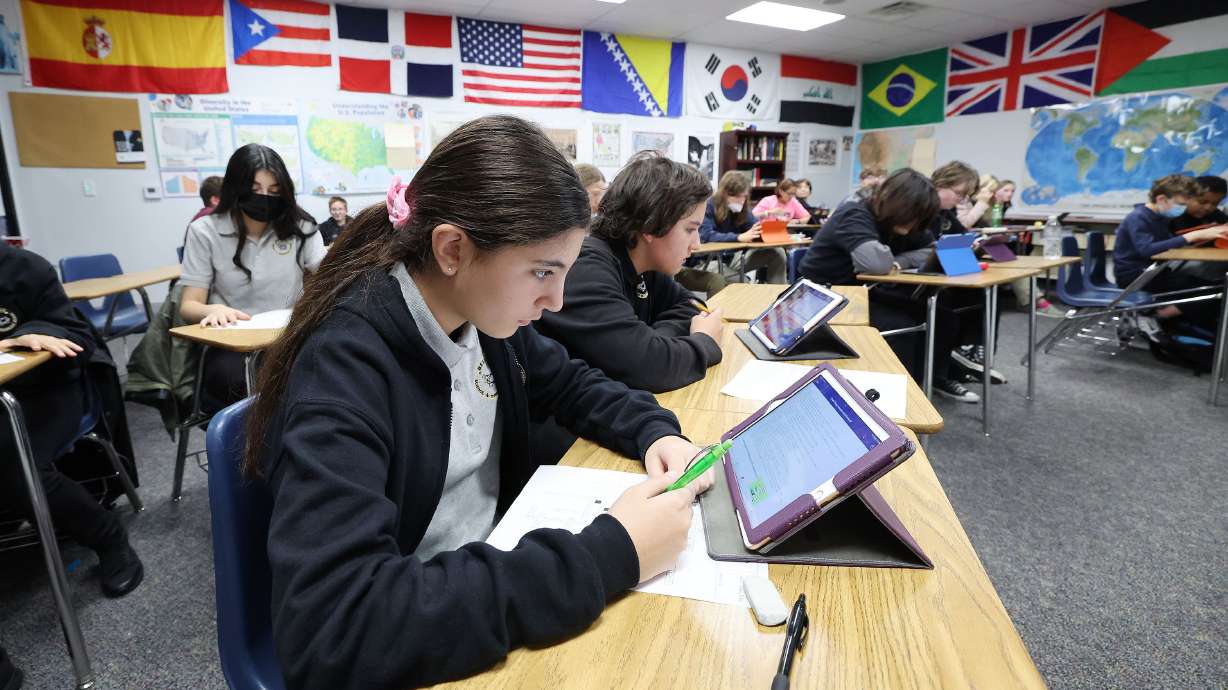 Rebeca Fontes works in a geography class at the Beehive Science and Technology Academy in Sandy on Nov. 3, 2022. Twelve charter schools could soon join the Beehive State's existing network after submitting proposals for formal consideration.