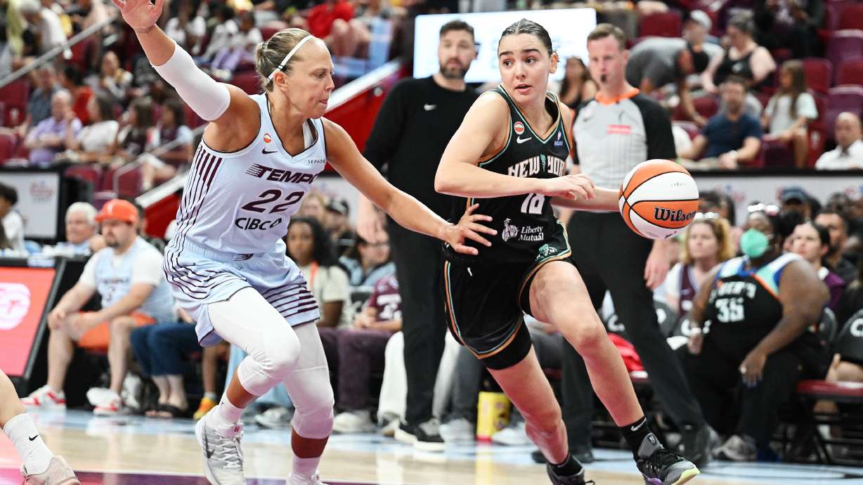 Toronto Tempo's Julie Allemand (22) defends against New York Liberty's Pauline Astier (18) during the second half of a WNBA basketball game in Montreal, on Sunday, July 12, 2026.