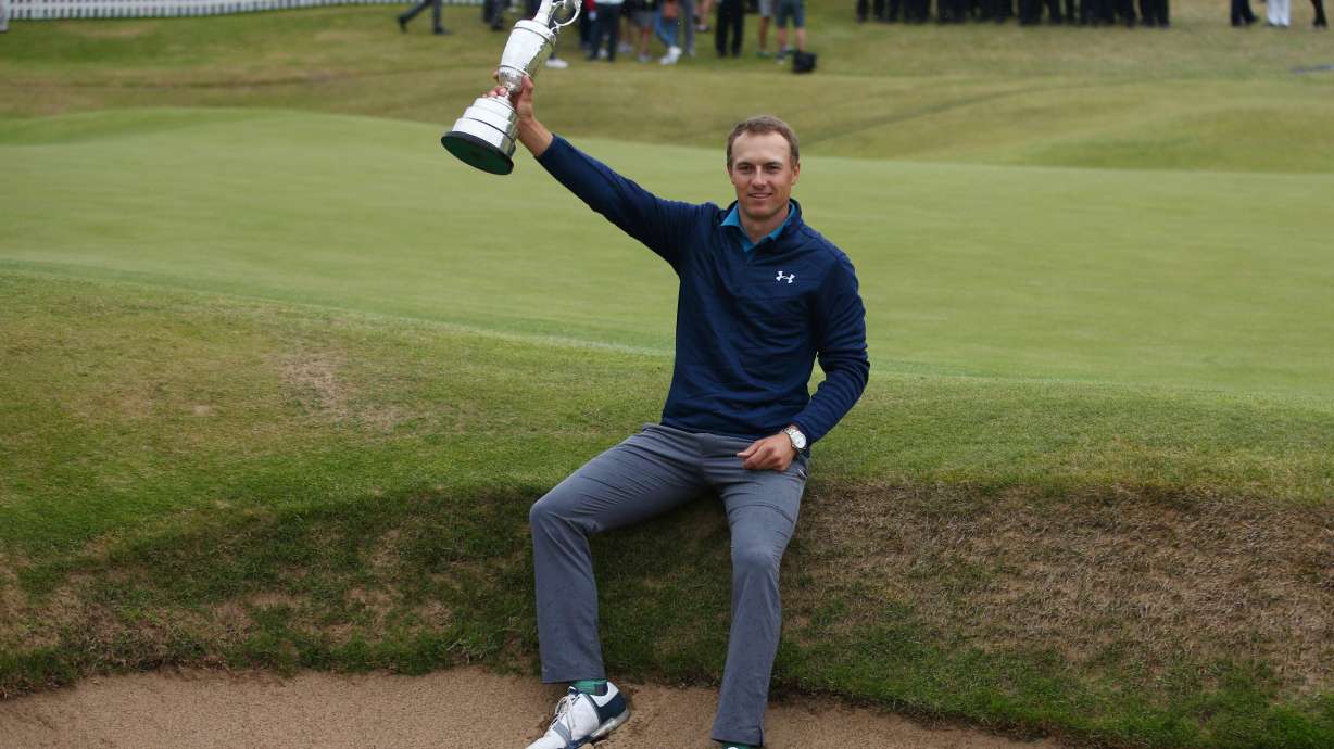 FILE - Jordan Spieth of the United States holds the trophy after winning the British Open Golf Championships at Royal Birkdale, Southport, England, July 23, 2017.