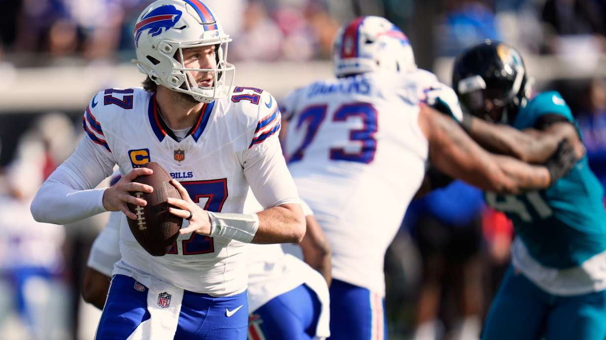 FILE - Buffalo Bills quarterback Josh Allen (17) looks for a receiver during the second half of an NFL wild card playoff football game against the Jacksonville Jaguars, Jan. 11, 2026, in Jacksonville, Fla.