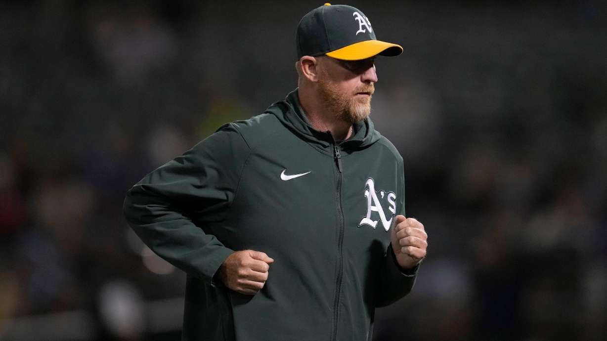 FILE - Oakland Athletics pitching coach Scott Emerson jogs during a baseball game against the Toronto Blue Jays in Oakland, Calif., Sept. 5, 2023.