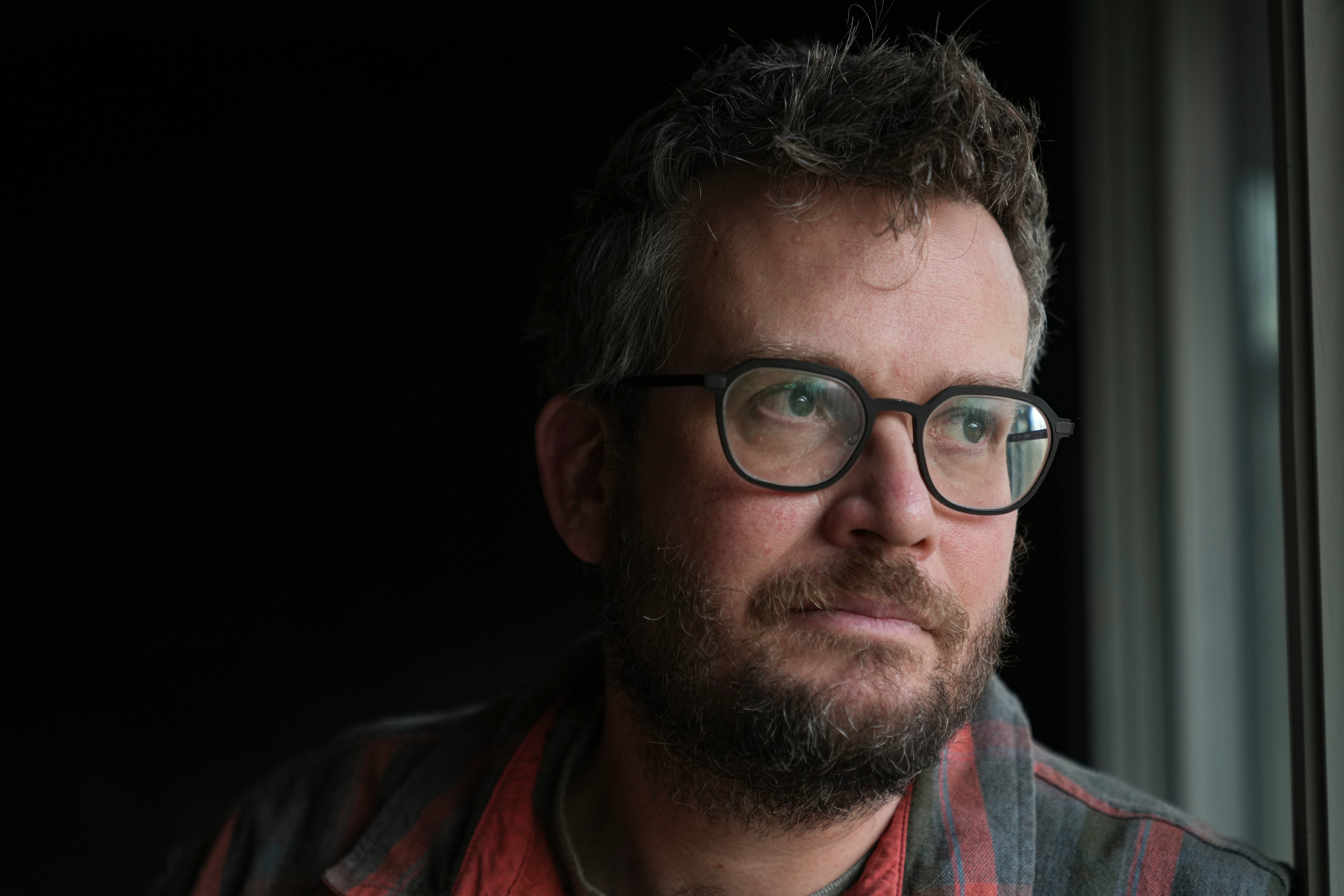 Writer John Green poses in his studio in Indianapolis, Jan. 21.