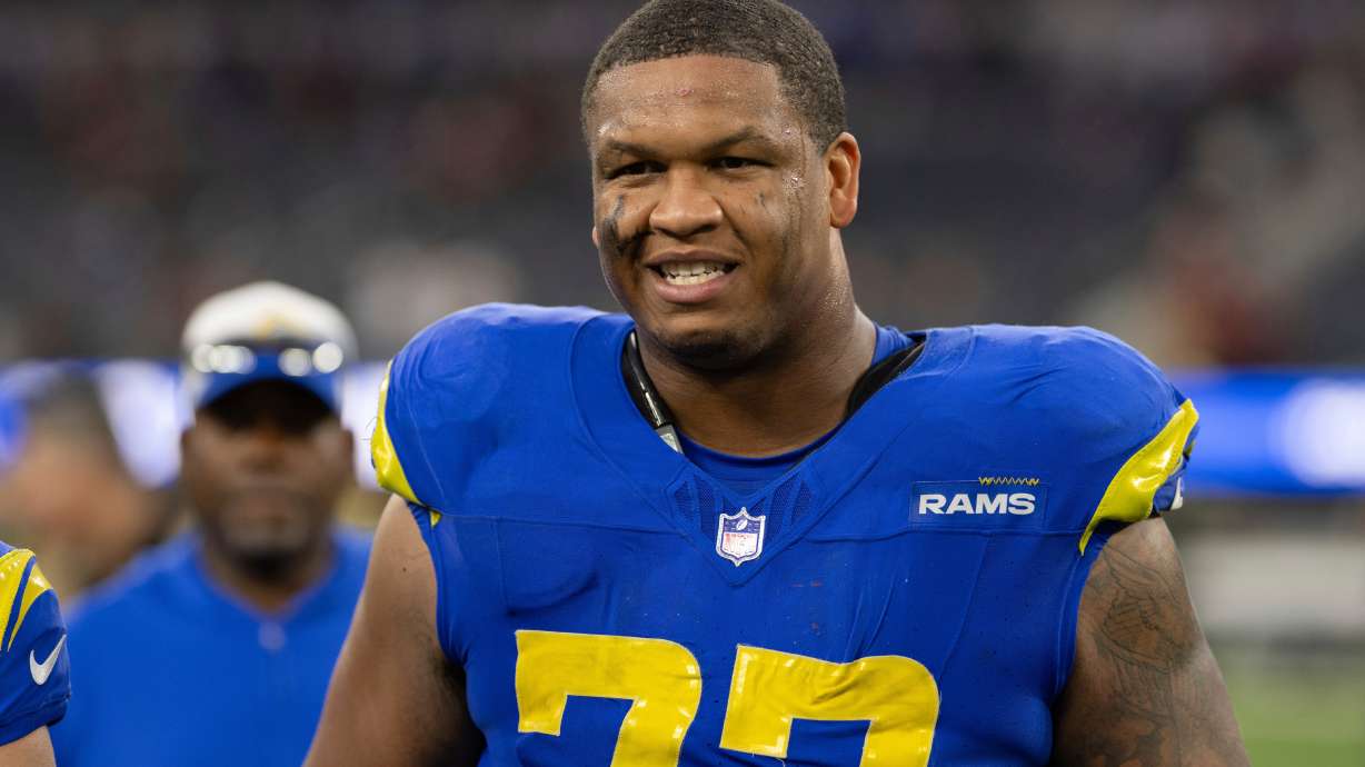 FILE - Los Angeles Rams offensive tackle Alaric Jackson (77) walks back to the locker room after an NFL football game against the Washington Commanders, Dec. 17, 2023, in Inglewood, Calif.
