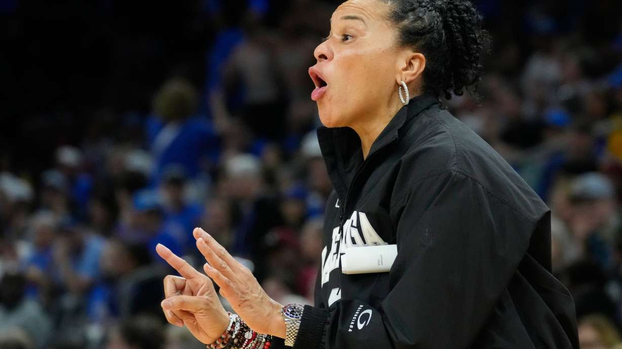 FILE - South Carolina head coach Dawn Staley motions towards the court against UCLA during the second half of the women's National Championship Final Four NCAA college basketball tournament game, April 5, 2026, in Phoenix.