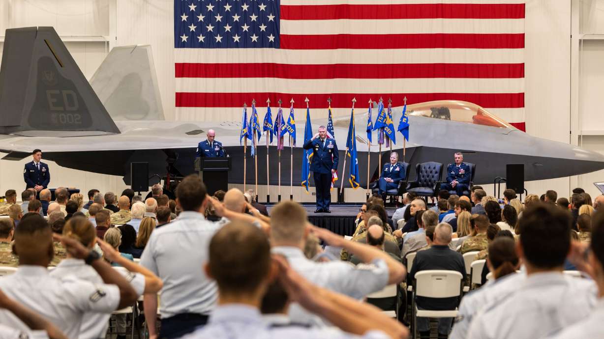 Col. Eric B. Quidley receives his first salute during a change of command ceremony at the Hill Aerospace Museum on Monday. Quidley is already eager to build on the momentum already existing at one of Utah's largest employers.