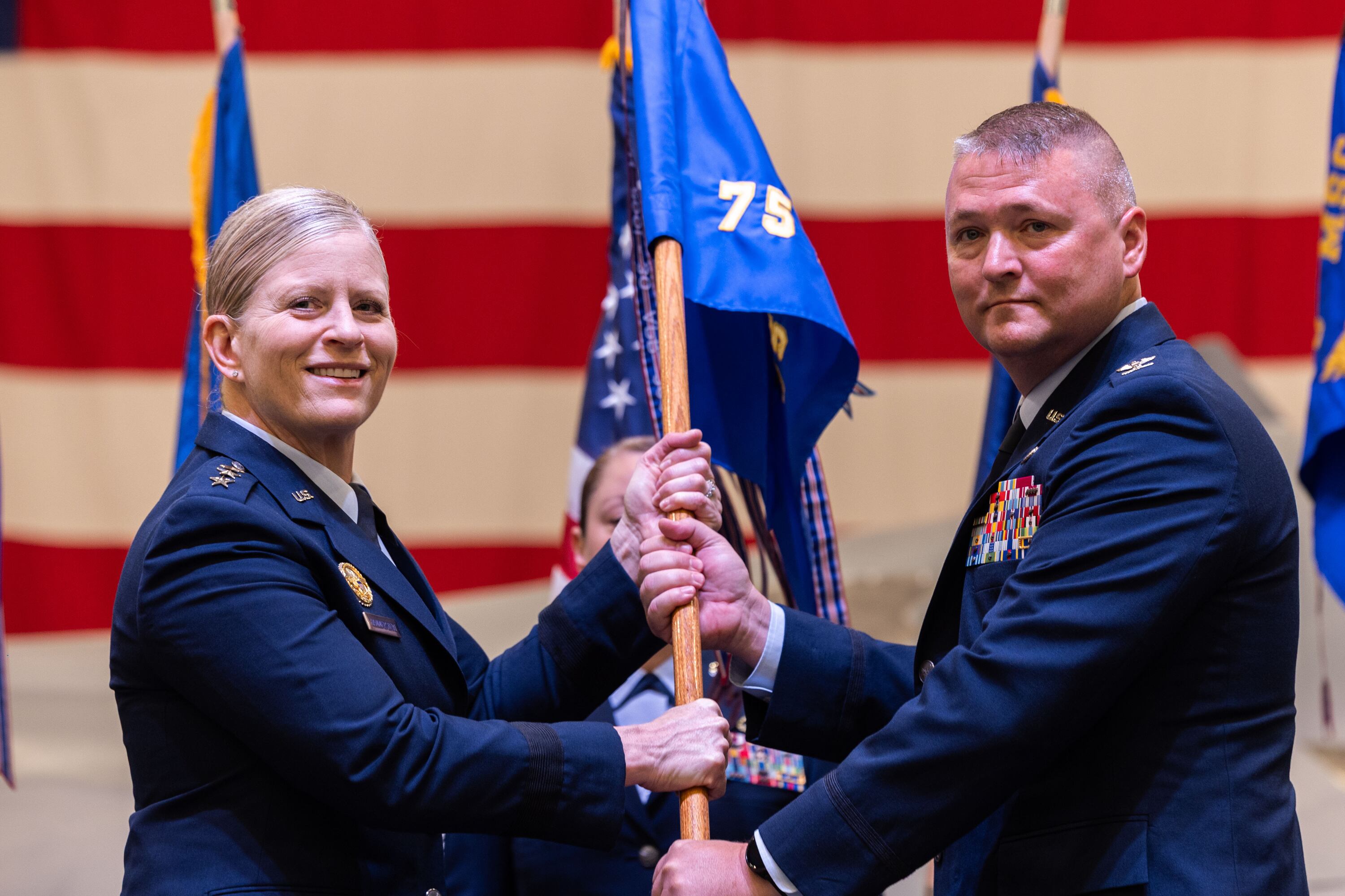 Col. Eric B. Quidley poses for a photo with Lt. Gen. Jennifer Hammerstedt during a change of command ceremony at the Hill Aerospace Museum on Monday.