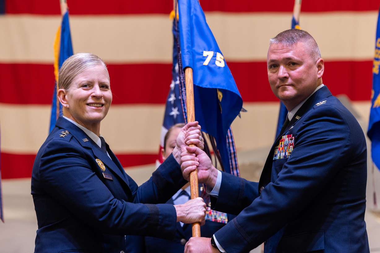 Col. Eric B. Quidley poses for a photo with Lt. Gen. Jennifer Hammerstedt during a change of command ceremony at the Hill Aerospace Museum on Monday.