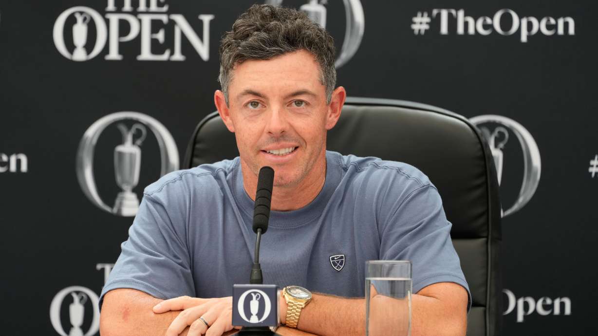 Rory McIlroy of Northern Ireland speaks at a press conference ahead of the British Open Golf championships at Royal Birkdale golf club, in Southport, England, Tuesday, July 14, 2026.