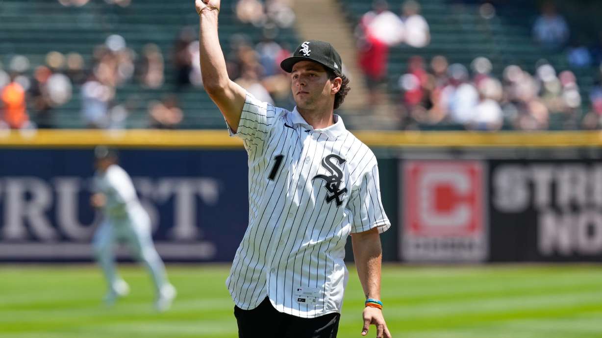Chicago White Sox's Roch Cholowsky, first round of the 2026 MLB draft (No. 1 overall), throws a ceremonial first pitch before a baseball game between the Athletics and the White Sox in Chicago, Sunday, July 12, 2026.