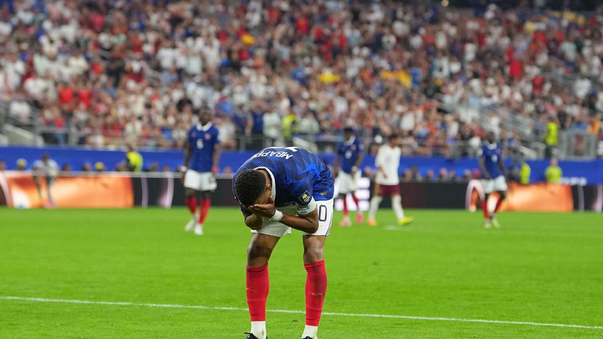 France's Kylian Mbappe reacts during a World Cup semifinal soccer match against Spain in Arlington, Texas, near Dallas, Tuesday, July 14, 2026.