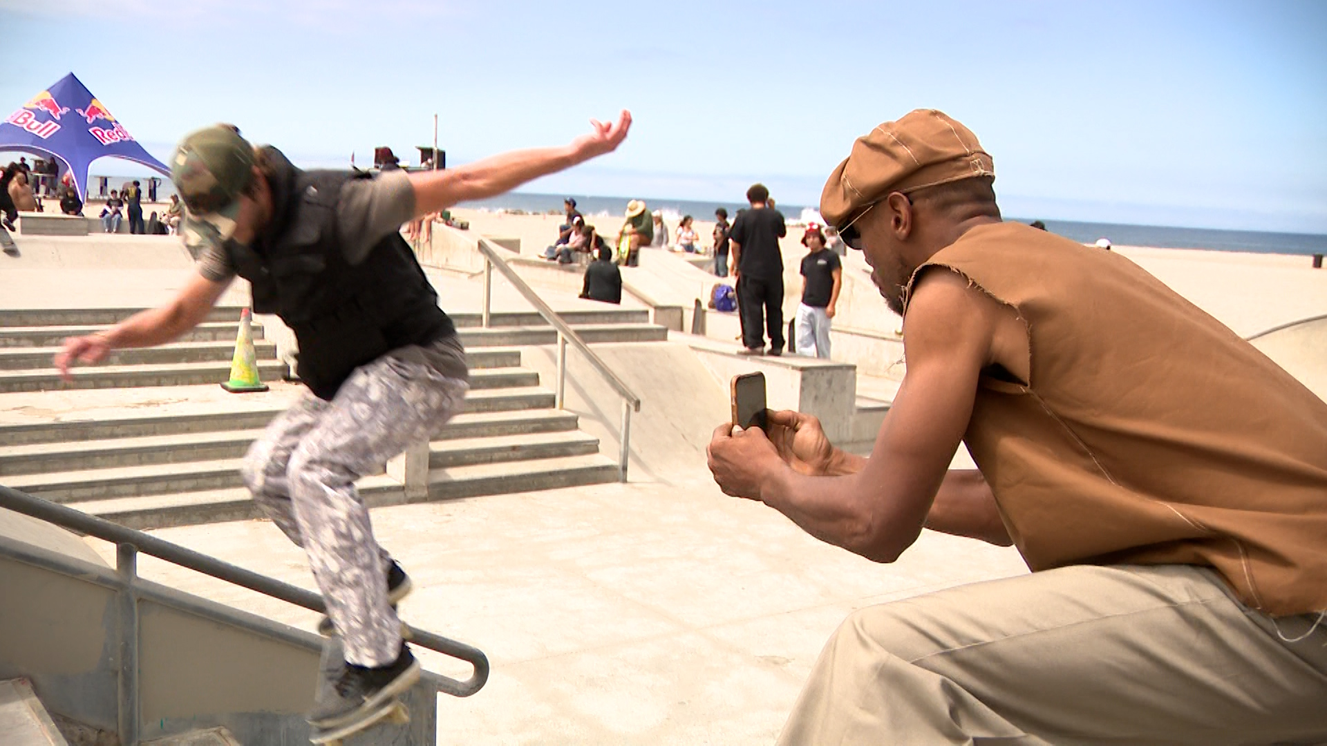 Runson Willis is pictured cheering on a skateboarder at Venice Beach Skatepark in Los Angeles.