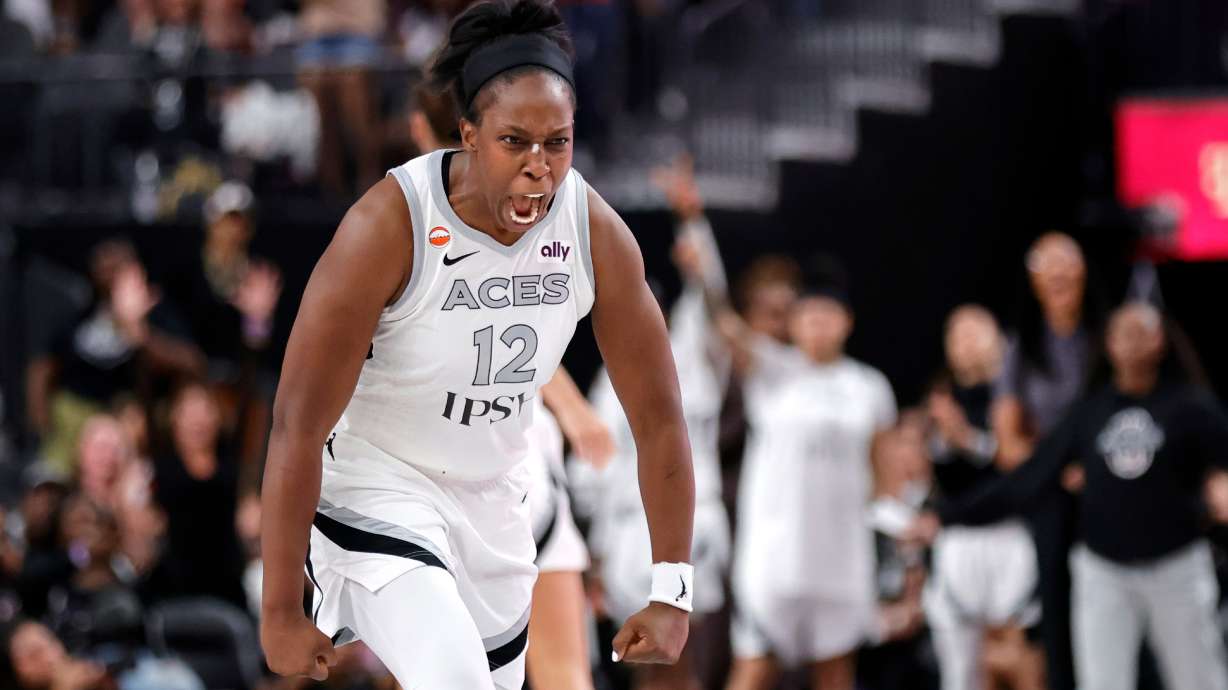 Las Vegas Aces guard Chelsea Gray (12) reacts after making a basket to send the game into overtime during the second half of an WNBA basketball game against the Chicago Sky Friday, July 3, 2026, in Las Vegas.