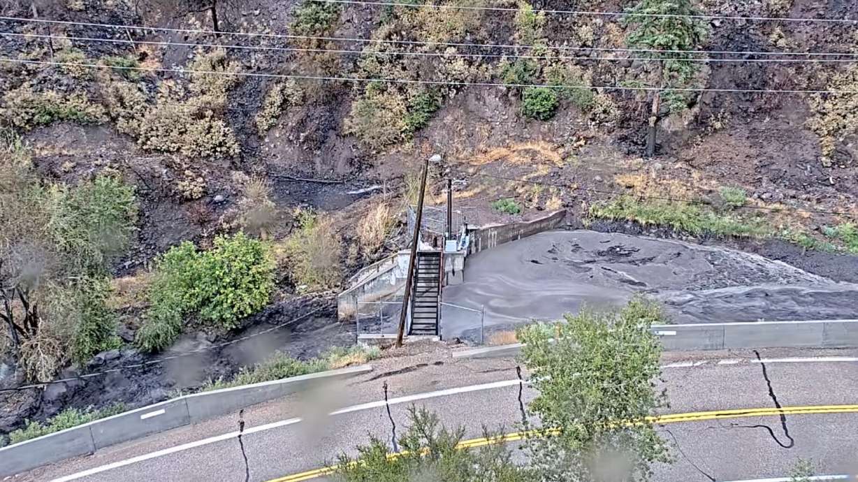 Water buildup forms next to state Route 153 in Beaver County after a storm Tuesday afternoon. Beaver officials said they had to shut off the area's pressurized irrigation system because dirty water from flooding had entered it.