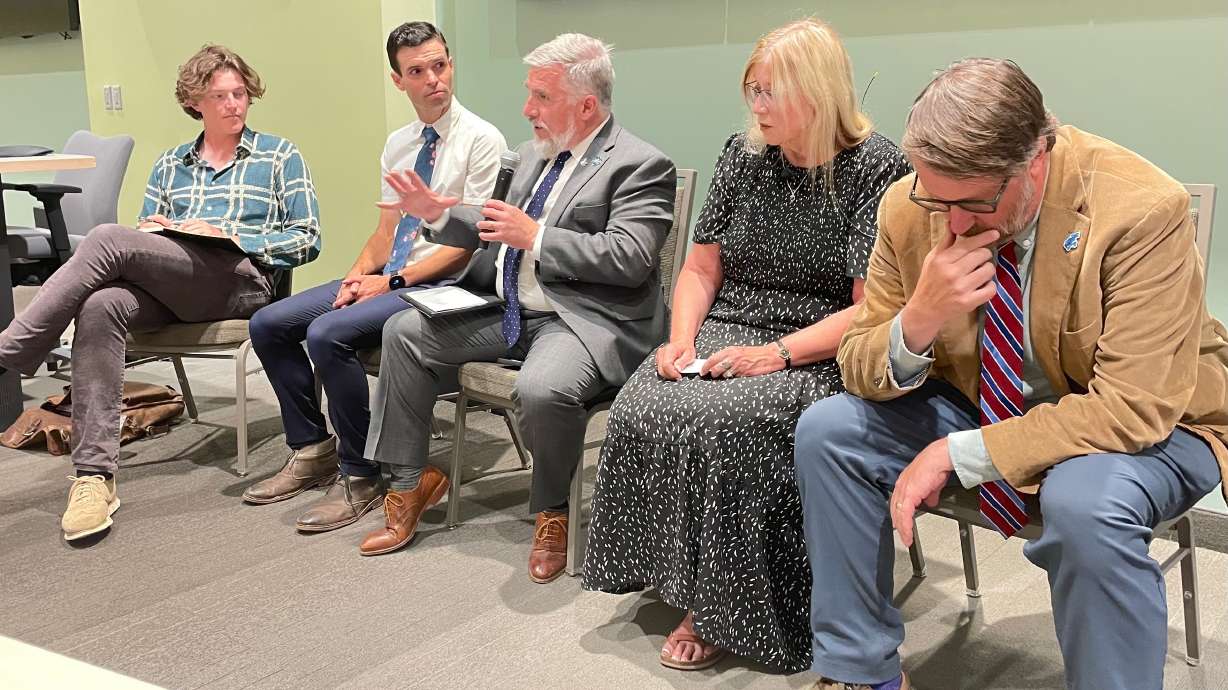 Mark Shepherd, center, a member of the body that voted for the controversial Box Elder County data center plans, speaks at a forum on the plans on Tuesday at the Utah State University Brigham City campus.
