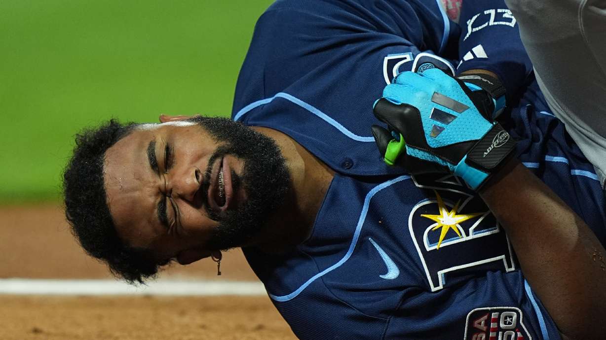 Tampa Bay Rays' Junior Caminero reacts after being hit by a pitch by St. Louis Cardinals' Riley O'Brien in the third inning of the MLB baseball All-Star Game between the American League and National League, Tuesday, July 14, 2026, in Philadelphia.