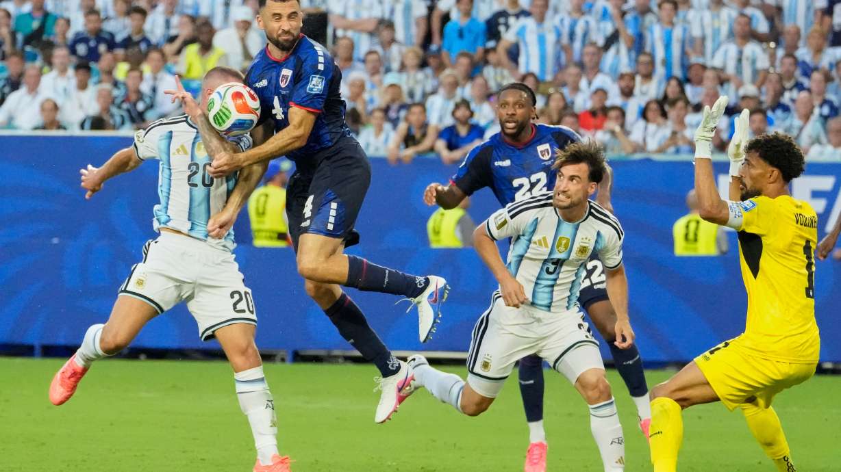 Argentina's Alexis Mac Allister (20) and Cape Verde's Pico Lopes (4) compete for the ball during the World Cup round of 32 soccer match between Argentina and Cape Verde in Miami Gardens, Fla., Friday, July 3, 2026.