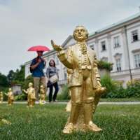 A horde of golden mini-Mozarts marks 270 years since the composer's birth in Salzburg