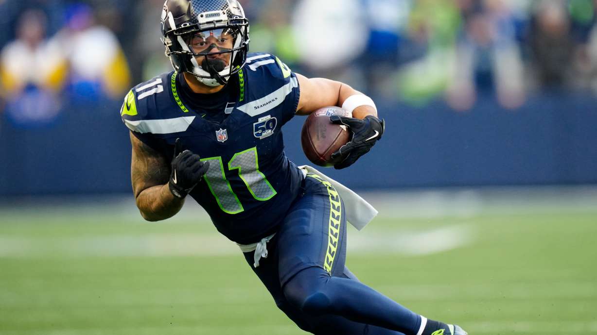 FILE - Seattle Seahawks wide receiver Jaxon Smith-Njigba (11) runs with the ball during the NFC Championship NFL football game Jan. 25, 2026, in Seattle.