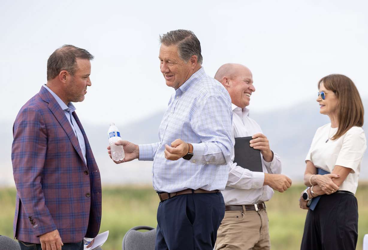 Utah House Speaker Mike Schultz, left, speaks with Tage Flint, executive director of Utah Water Ways, as Joel Ferry, commissioner of Utah Department of Natural Resources, speaks with Salt Lake County Deputy Mayor Catherine Kanter, following a press conference in Salt Lake City on Wednesday.