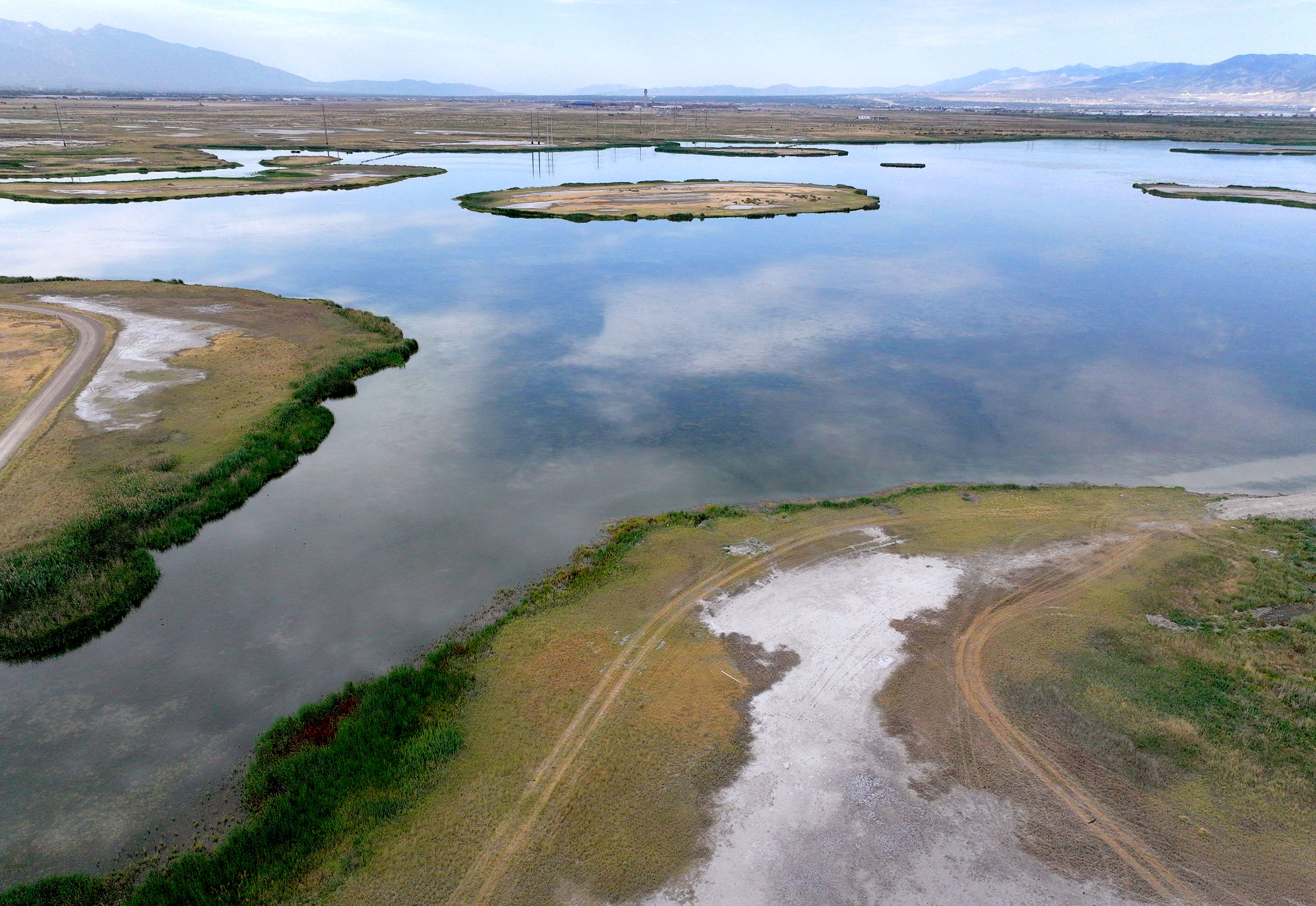 Wetlands of the Great Salt Lake in Salt Lake City are pictured on Wednesday. Wetlands of the Great Salt Lake and industrial properties located on 2200 West in Salt Lake City are pictured on Wednesday. The Utah Inland Port Authority announced new funding and partnerships that seek to improve the Great Salt Lake ecosystem.