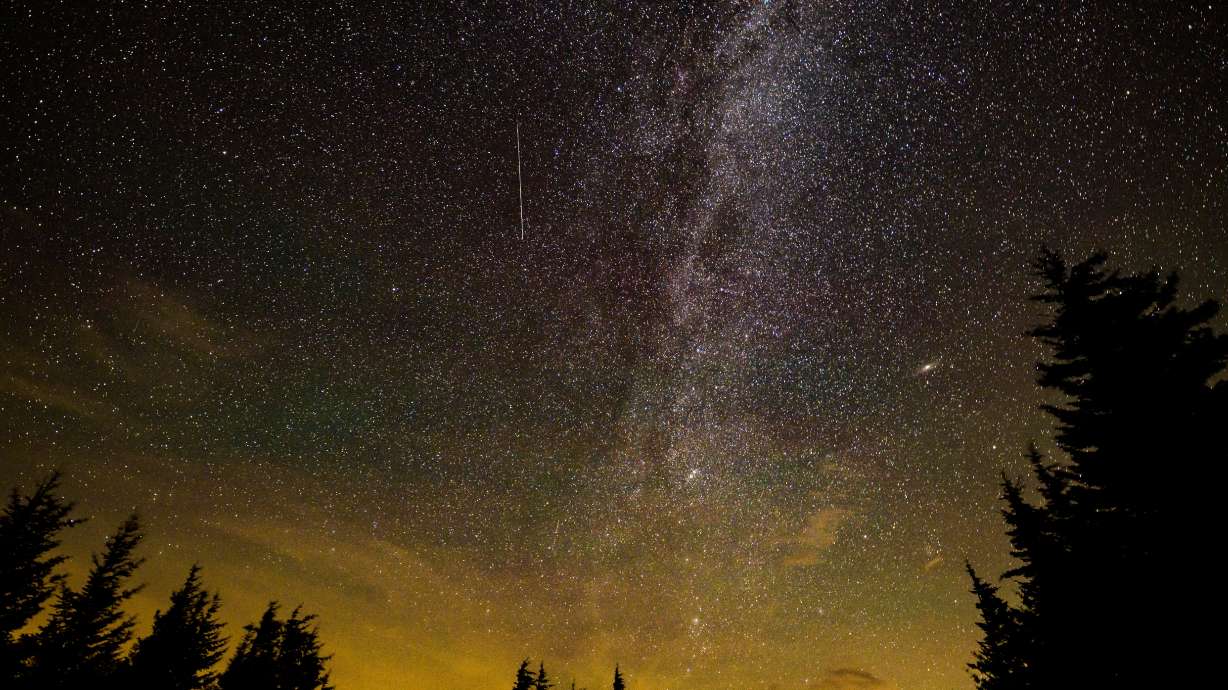 In this 30 second cameras exposure, a meteor streaks across the sky during the annual Perseid meteor shower, Aug. 11, 2021, in Spruce Knob, W.V. The next few weeks could provide optimum opportunities to enjoy cosmic displays.