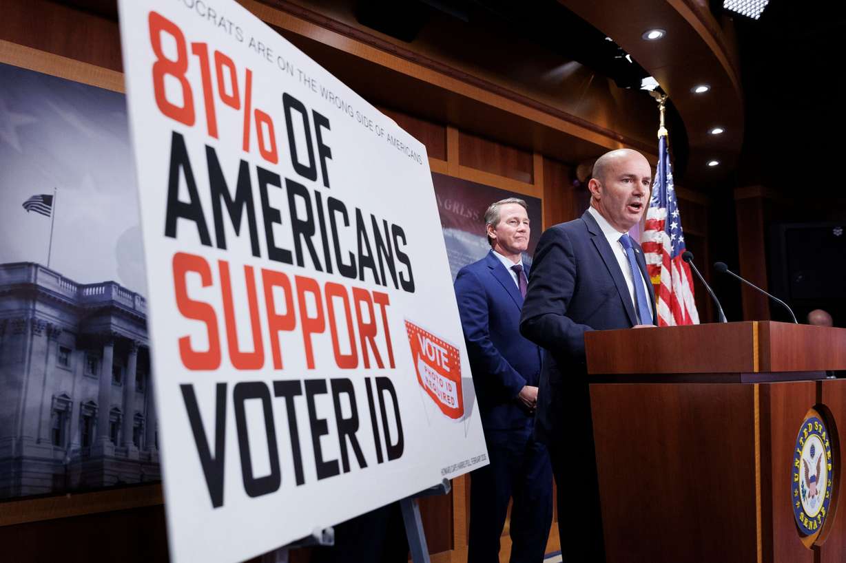 Sen. Mike Lee, joined by Sens. Rick Scott, R-Fla., and Jon Husted, R-Ohio, during a news conference regarding the SAVE Act on March 19 in Washington. Republicans are attempting to include portions of Lee's bill in the newest budget reconciliation bill.